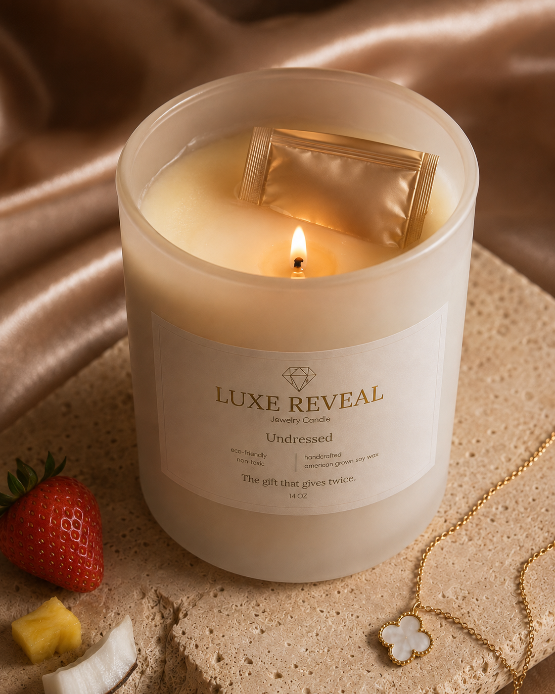 Sealed protective jewelry pouch emerging from the melted wax of the Undressed candle, with the necklace displayed beside it