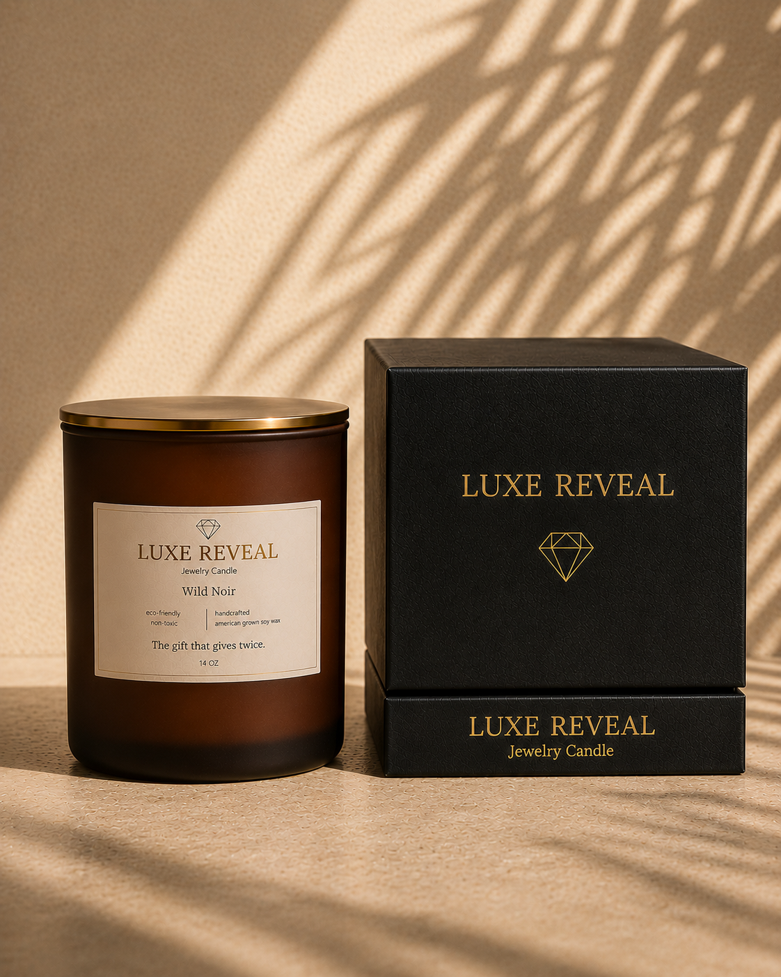 Wild Noir Luxe Reveal candle beside the closed black Luxe Reveal gift box in warm sunlight
