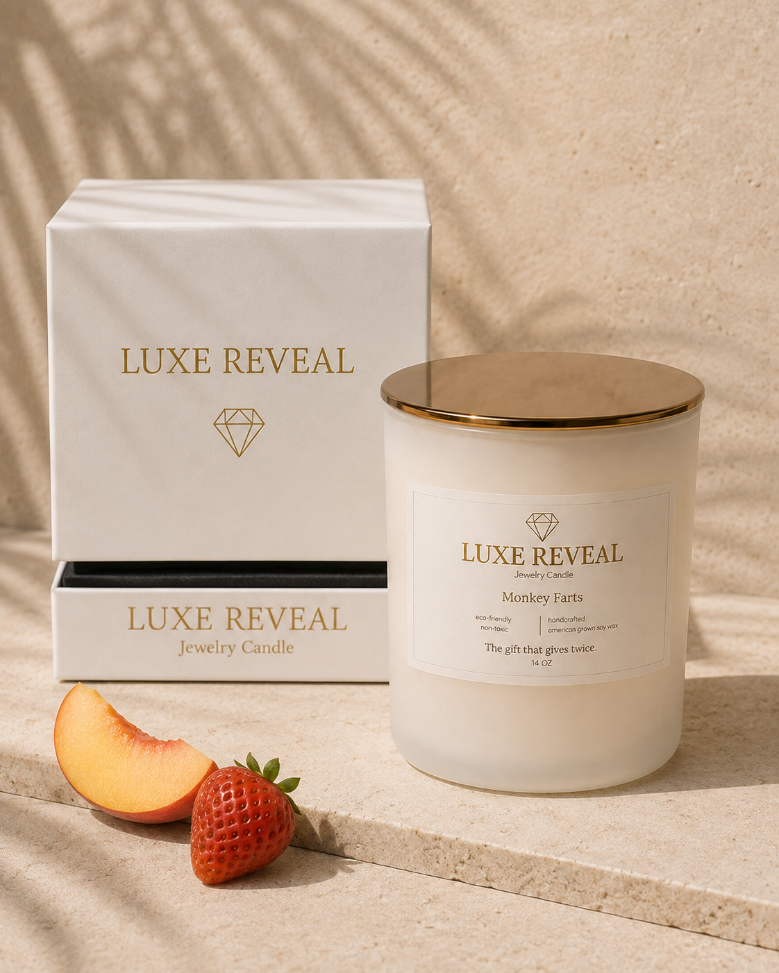 Monkey Farts Luxe Reveal candle beside the open white Luxe Reveal gift box