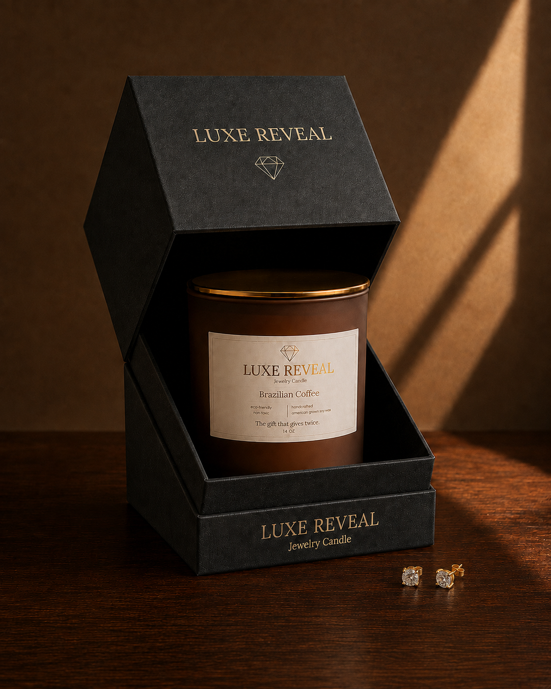 Brazilian Coffee Luxe Reveal candle inside its open gift box with earrings displayed beside it