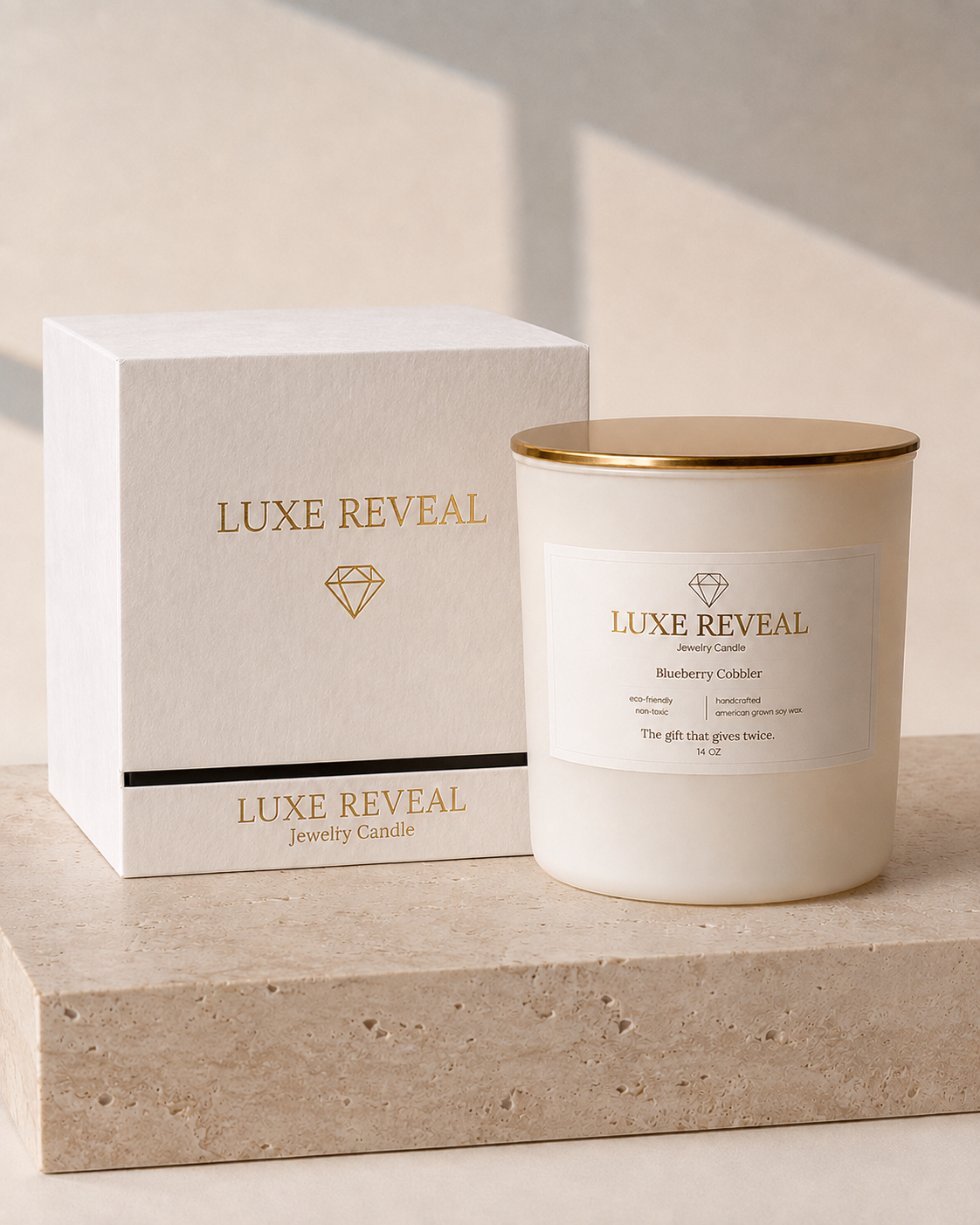 Blueberry Cobbler Luxe Reveal candle with its Luxe Reveal gift box